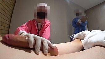 Interracial Doctor And Nurse Engage In Public Handjob